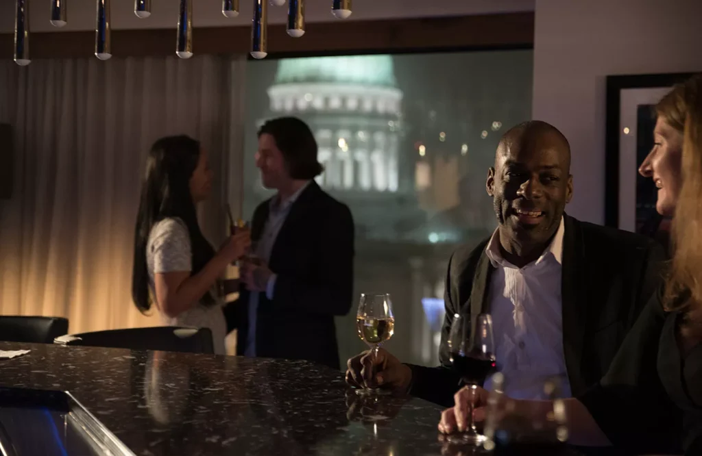 Couples enjoying drinks in the Governor's Club lounge